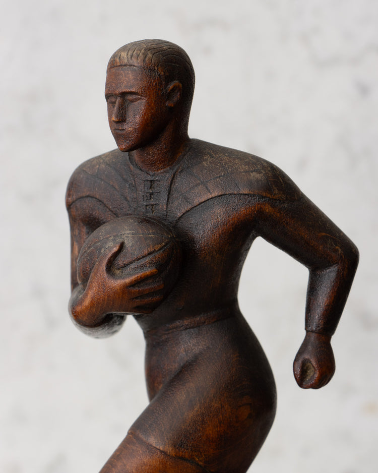 Carved Wooden Rugby Player