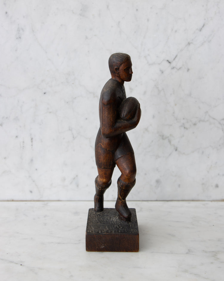 Carved Wooden Rugby Player
