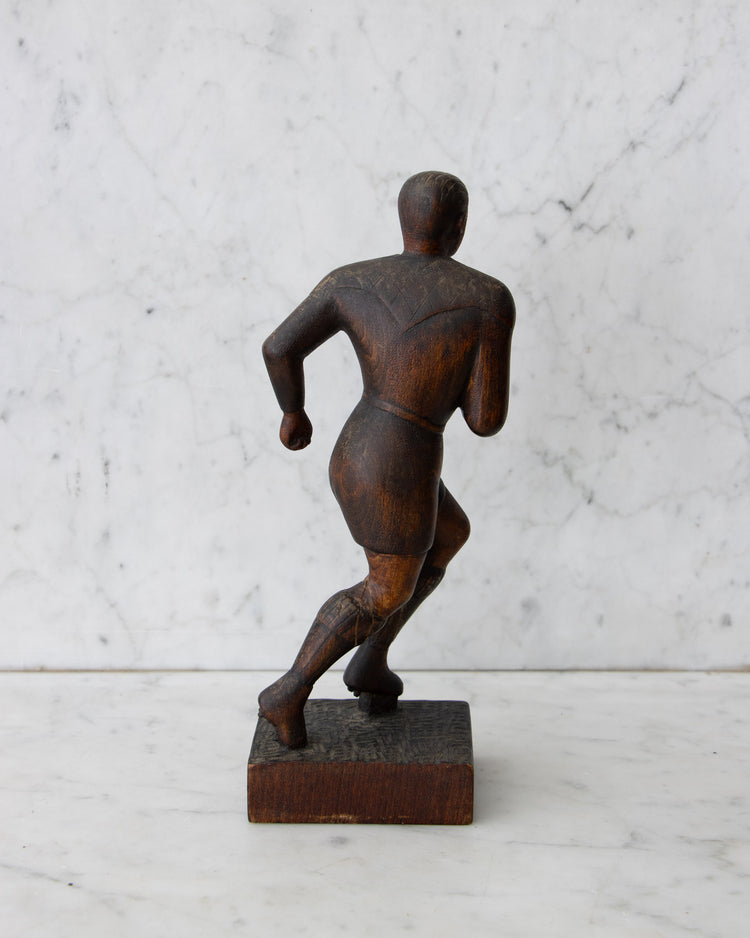 Carved Wooden Rugby Player