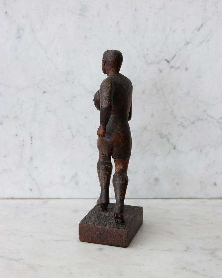 Carved Wooden Rugby Player