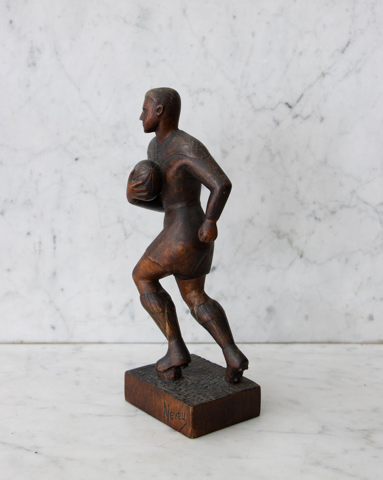 Carved Wooden Rugby Player