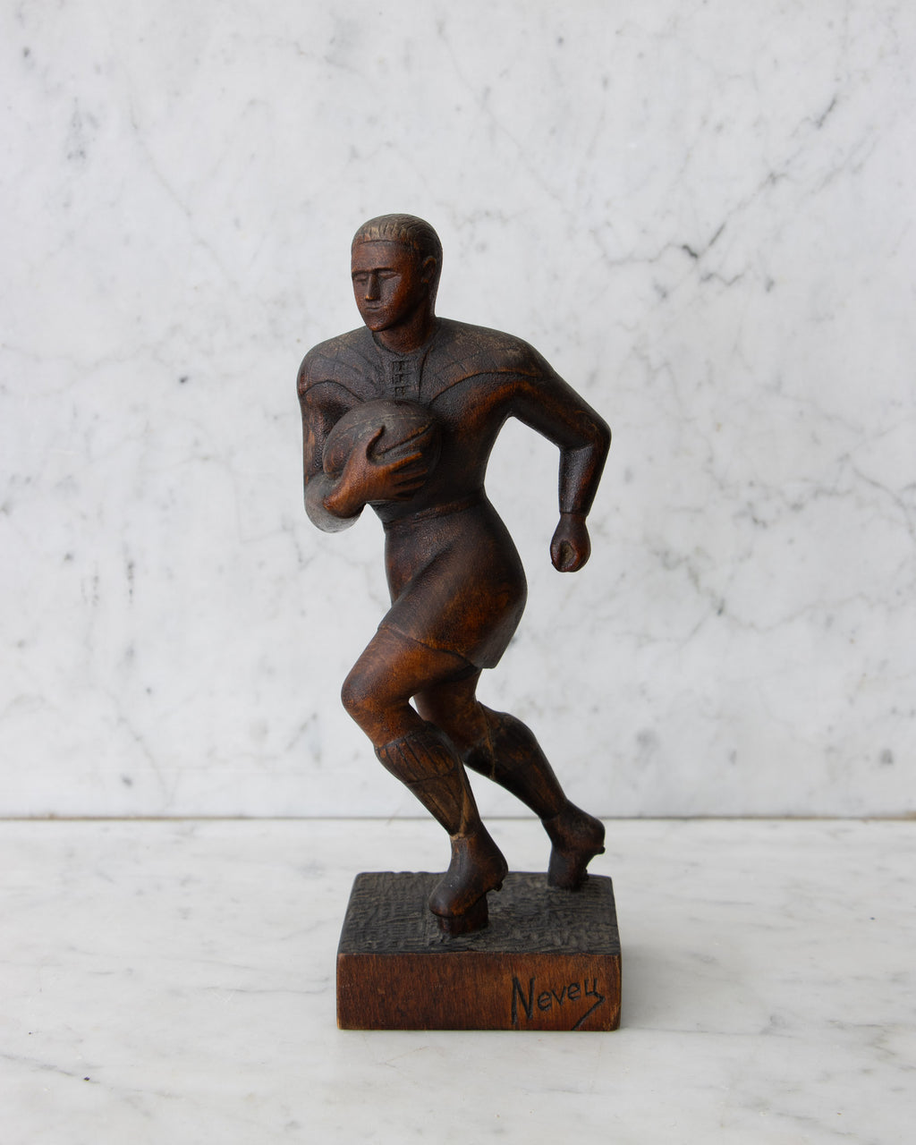 Carved Wooden Rugby Player